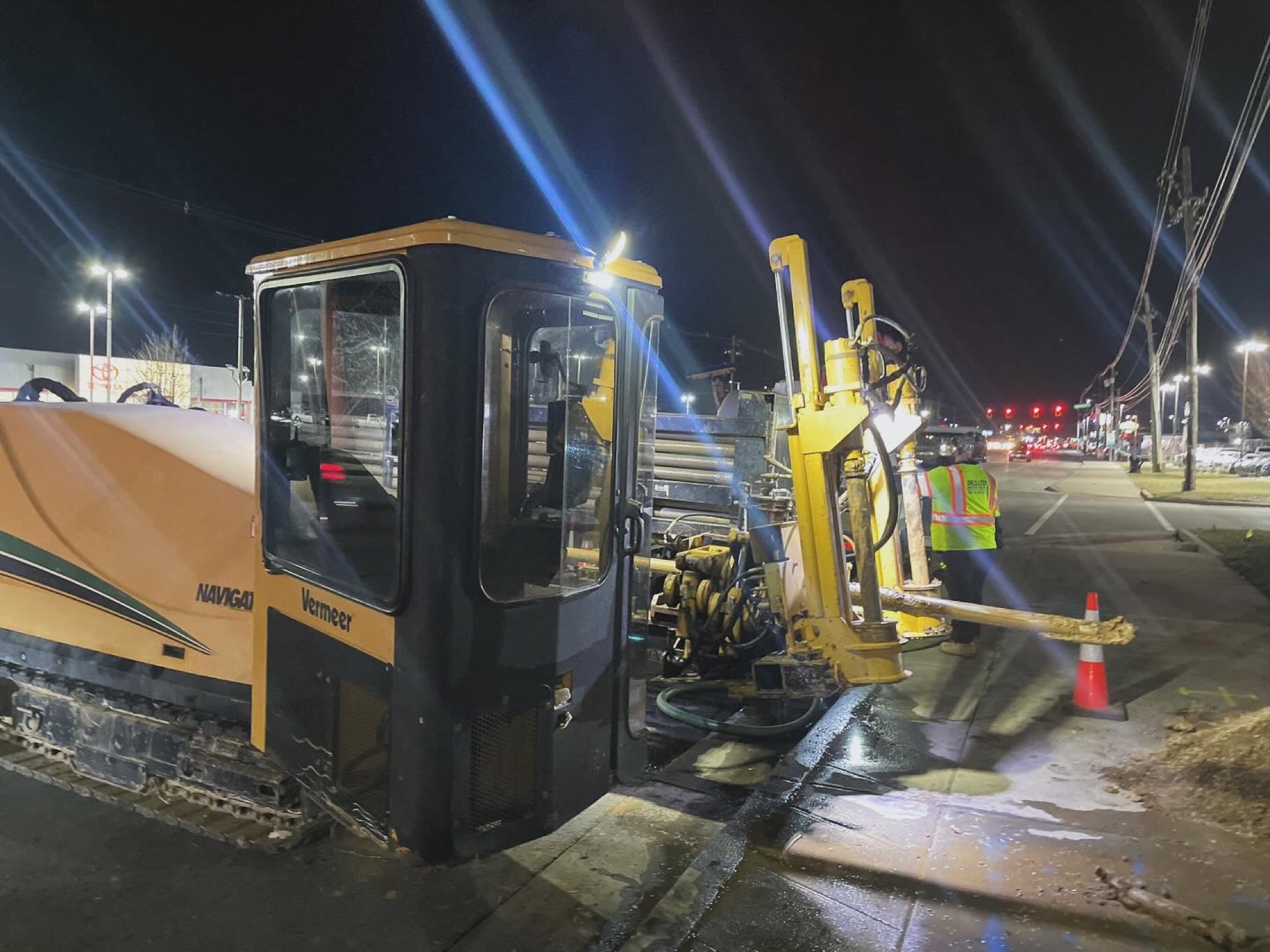 DrillTek Vermeer directional drill rig working a night job in Louisville, KY